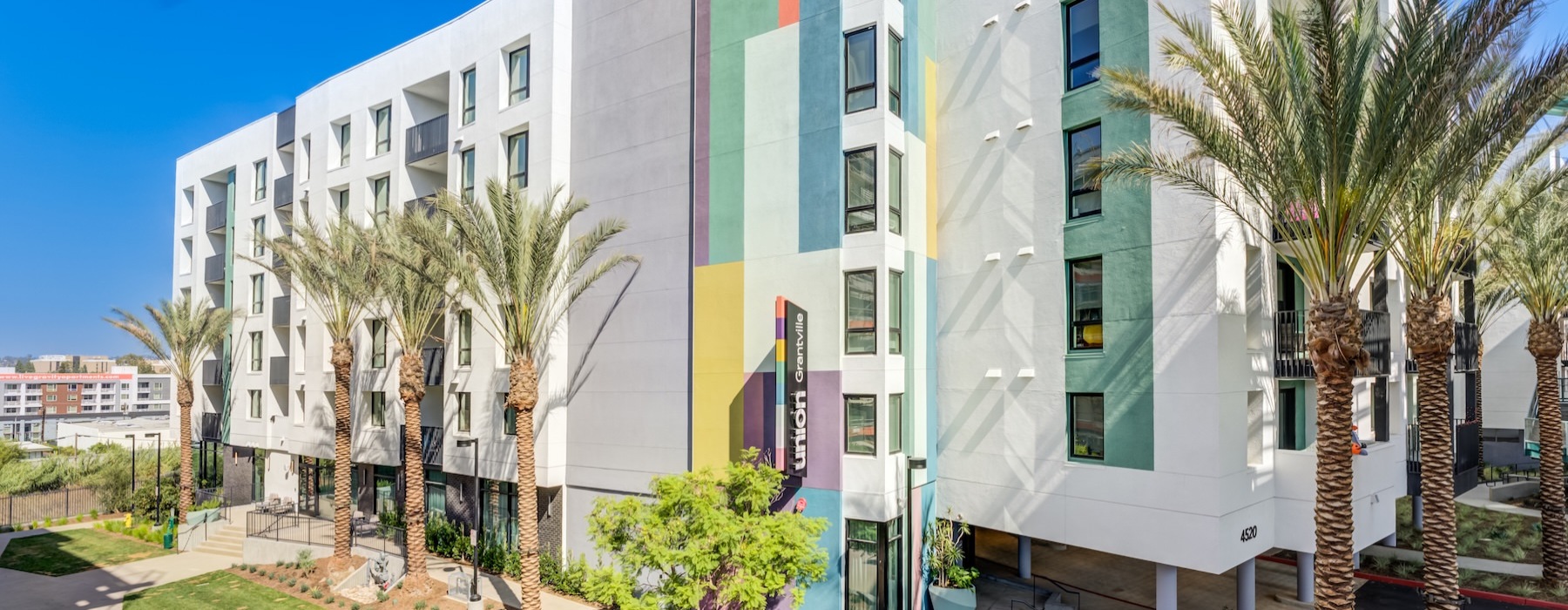 a building with palm trees