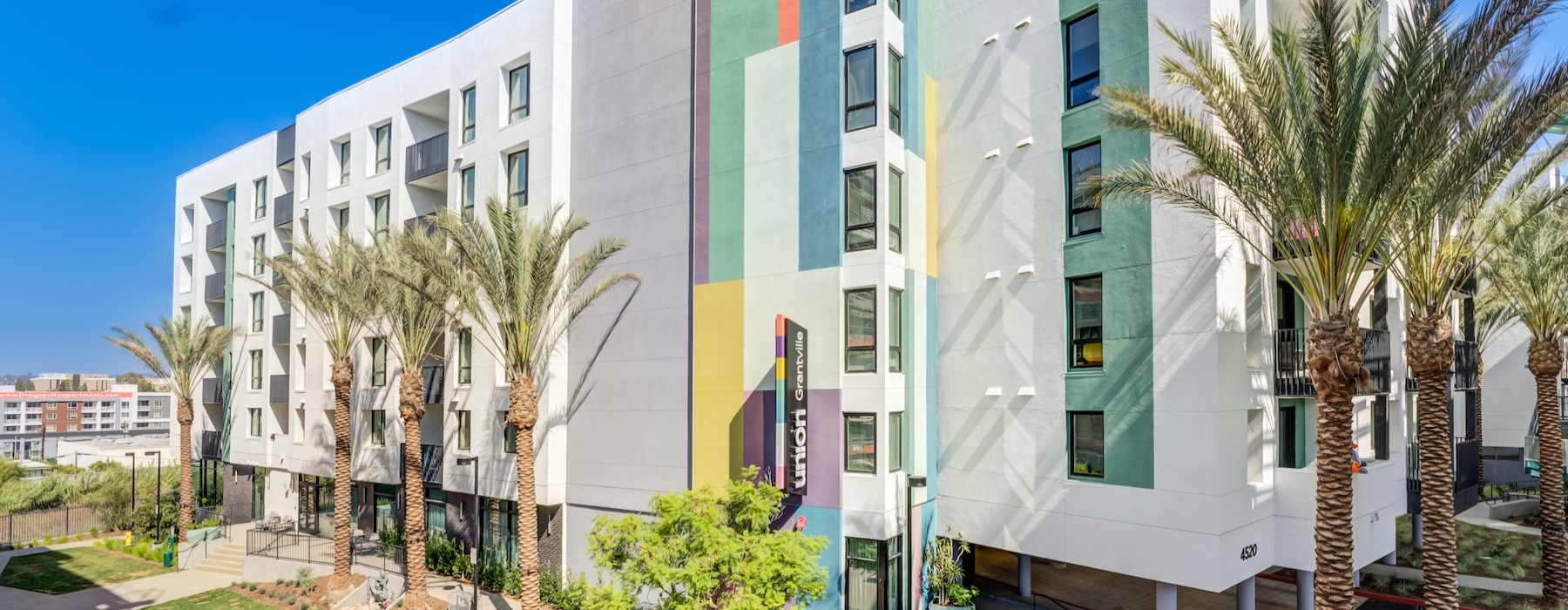 a building with palm trees